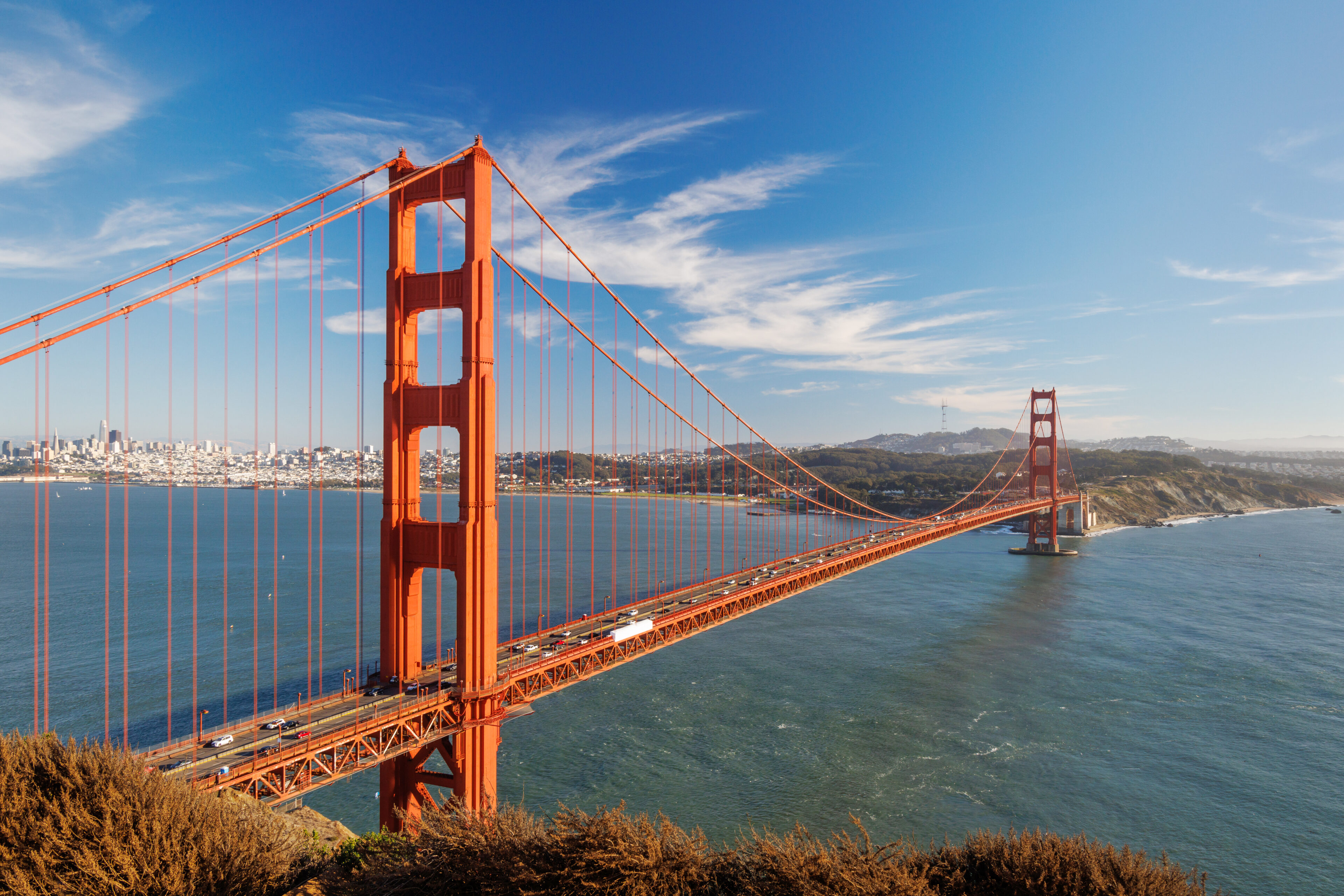 Golden Gate Bridge stretching across the water on a clear day.
